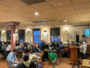 People gathered in the pub for Benedictine Heritage week