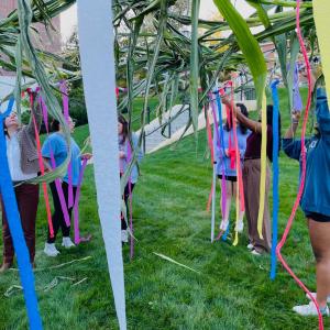 Students decorating part of the lower quad