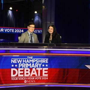 Two students sitting on the set of the ABC Debate