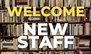 A bookshelf with the words "Welcome New Staff"