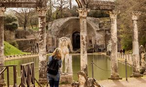 A student views Roman ruins