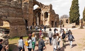 Group walking around Roman ruins