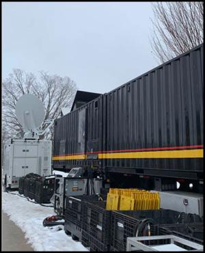 Media trucks were set up in front of Alumni Hall all week.