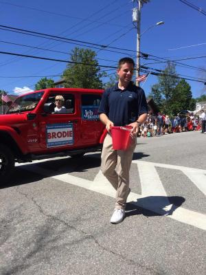 Brodie Deshaies walking down the street in a parade