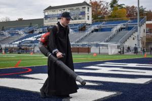 Fr. Basil Franciose, O.S.B. ’17 prepping the football field