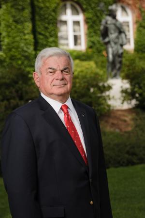 Walter Gallo in front of Alumni Hall