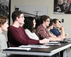 New NHIOP ambassadors sitting in classroom