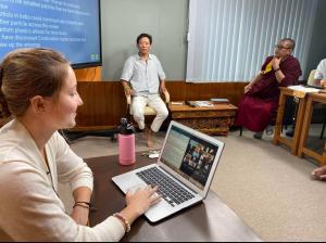 Emma Goulet teaching physics to Buddhist monks 