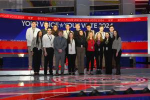 The 2024 Kevin B. Harrington Student Ambassadors gathered on the debate stage