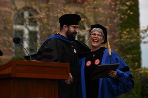 Professor Kevin Doran presents Professor Deborah McCarter with the AAUP Faculty Award