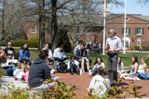 Professor Josh Tepley teaching his philosophy class on Alumni Quad