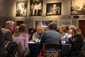 Participants in a roundtable discussion at a Center for Ethics Housing Forum