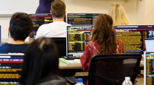 Students using the Bloomberg Terminals in the Bloomberg Finance Lab