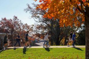 Visitors walking on campus in fall