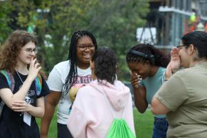 Transitions students conversing on the quad