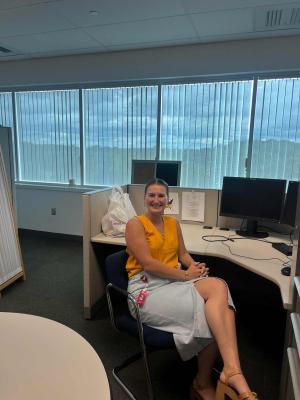 Grace Bolinsky sitting in the office for her internship with TJX/Marshalls