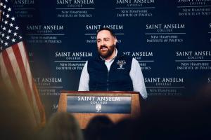 Gregg Cecconi speaking at a podium