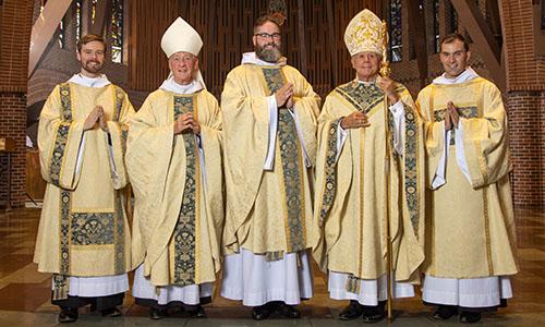 From left: Fr. Titus Michael Phelan, O.S.B. ’12, Abbot Mark Cooper, O.S.B. ’71, Fr. Francis Ryan McCarty, O.S.B. ’10, Bishop Peter A. Libasci, Fr. Basil Louis Franciose, O.S.B. ’17.