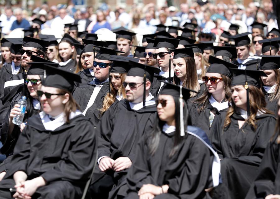 The class of 2020 listens to a speech 