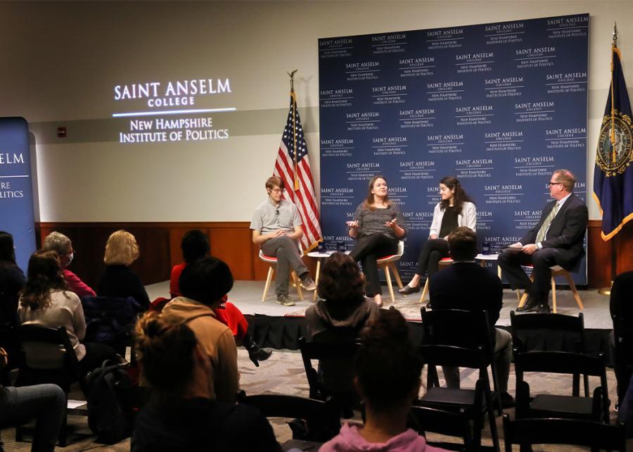 Journalists speak on stage