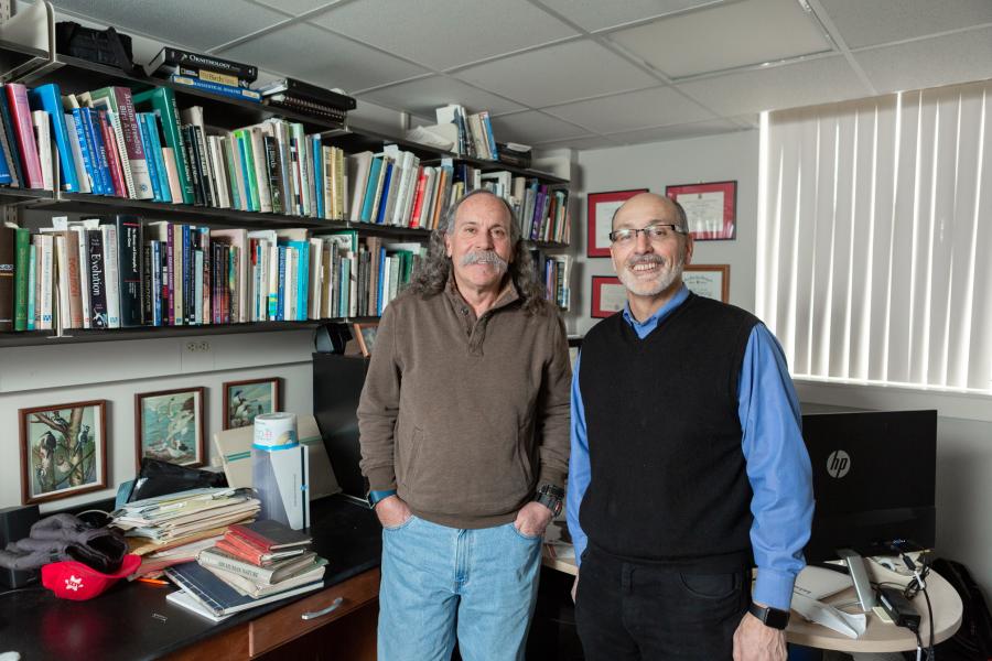 Professor Jay Pitocchelli and Professor David Guerra standing in an office