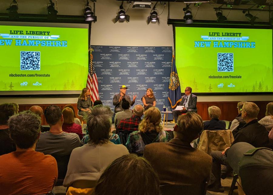 Audience listening to a talk at the NHIOP