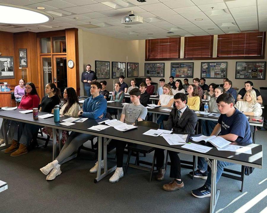 New NHIOP ambassadors sitting in classroom