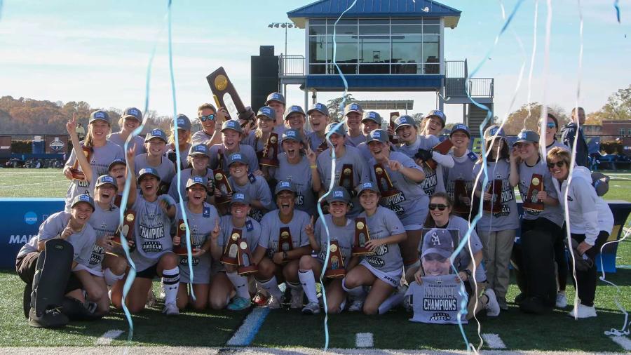 Women's Field Hockey Team celebrating their championship win